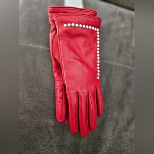 New red leather Bloomingdales gloves. Lining is cashmere. New never used.